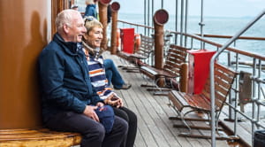 Old couple on a boat